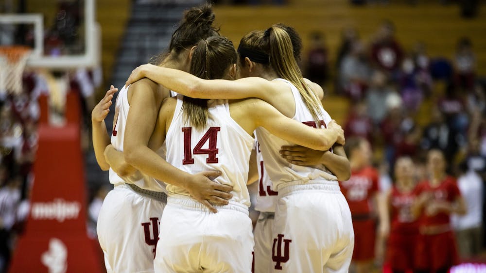 IU women’s basketball huddles up before their game Dec. 15 at Simon Skjodt Assembly Hall. No. 12 IU beat Youngstown State University 93-56. 