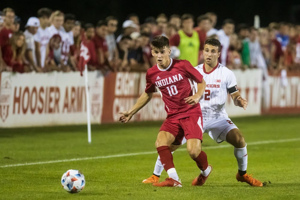 <p>Then-freshman forward Tommy Mihalic passes the ball to a teammate on Sept. 17, 2021, at Bill Armstrong Stadium. Indiana will face Penn State in the first round of the Big Ten Tournament Friday night.</p>