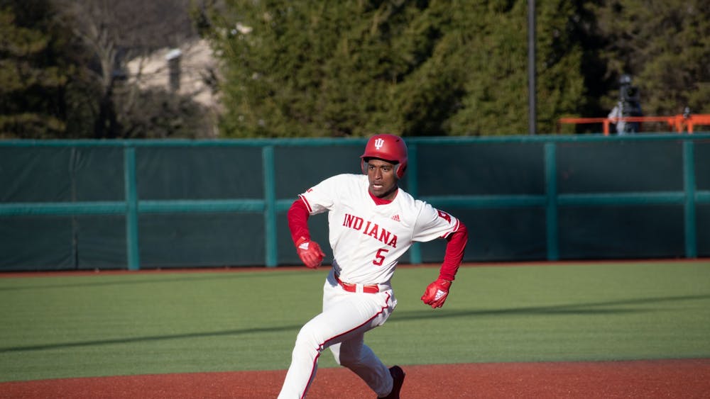 Freshman outfielder Devin Taylor runs to third base on Feb. 28, 2023, against Butler University at Bart Kaufman Field in Bloomington. On Thursday, Indiana defeated Morehead State University, 23-5.