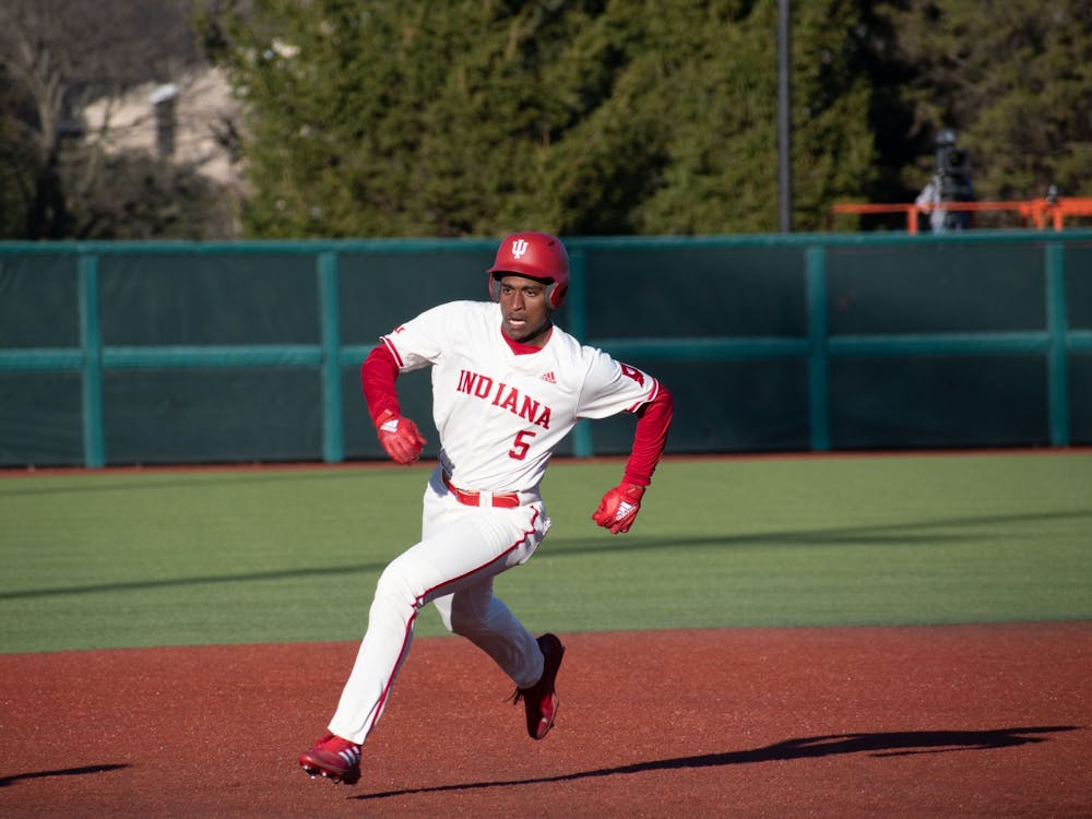 Freshman outfielder Devin Taylor runs to third base on Feb. 28, 2023, against Butler University at Bart Kaufman Field in Bloomington. On Thursday, Indiana defeated Morehead State University, 23-5.