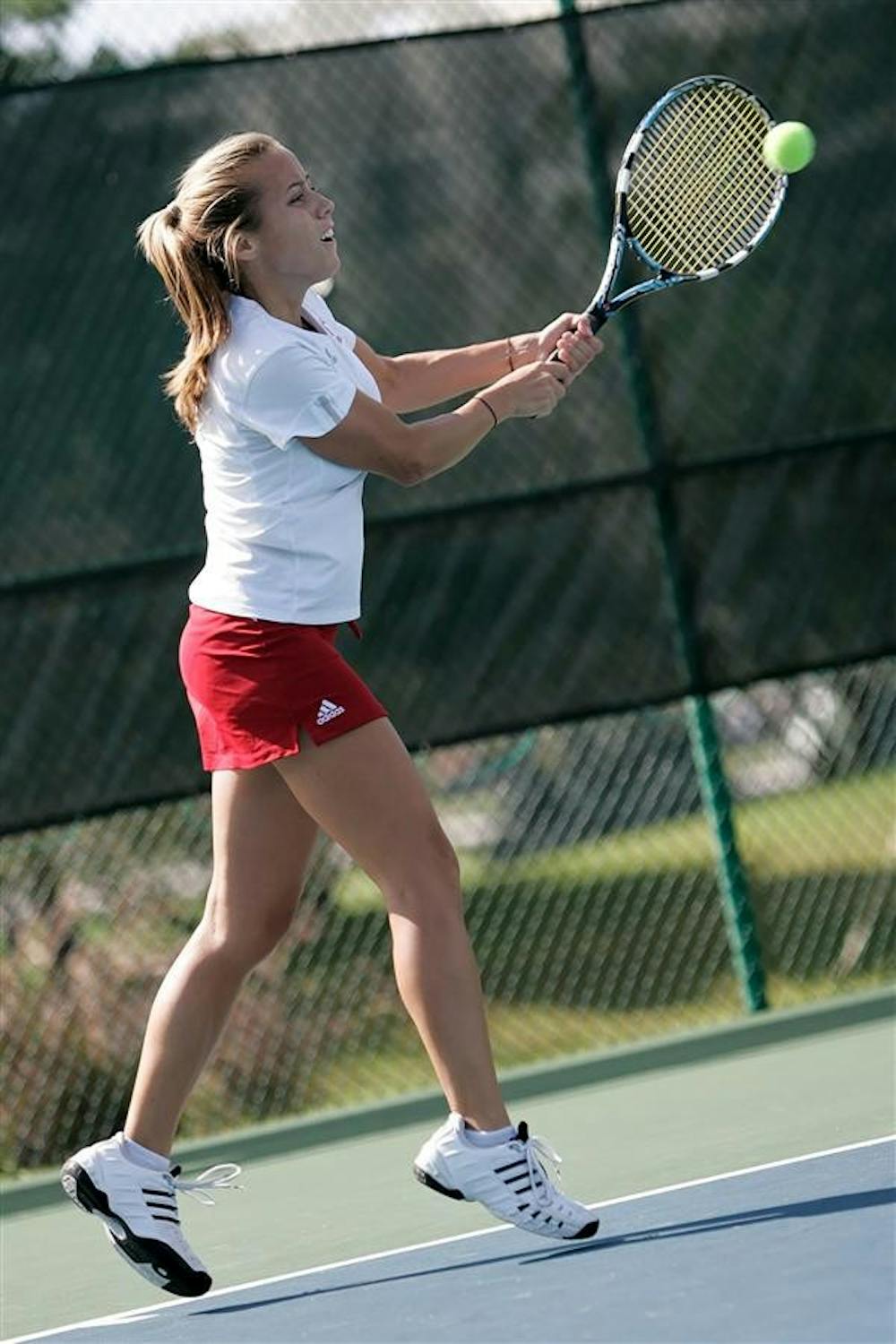 Senior Lindsey Stuckey hits a shot against Kansas State's Petra Chuda during the Hoosier Invitational on Saturday, Sept. 26 at the Varsity Tennis Courts. Stuckey prevailed 6-4, 6-1 while the Hoosiers dominated the event with an overall singles record of 19-4 while winning 12 of 15 doubles matches on the weekend. 