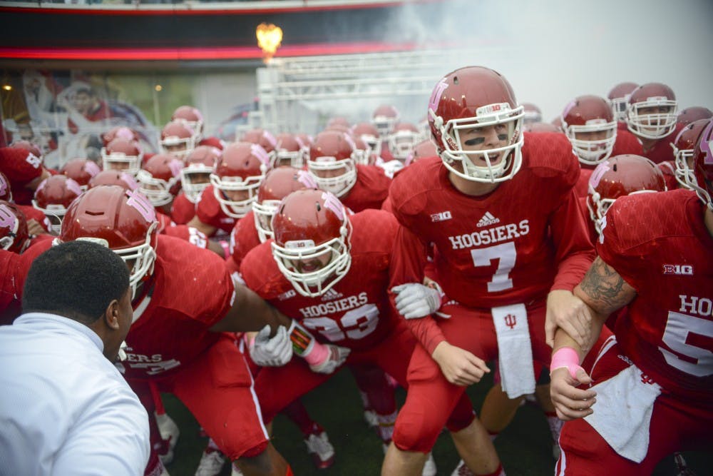 The team gets pumped up by coach Mark Hill before the game against Ohio State on Saturday at Memorial Stadium. The Hoosiers lost to the number one ranked Buckeyes, 27-34.