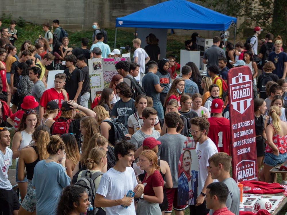 Hundreds of students wade through the crowds at the Involvement Fair Aug. 26, 2021, in Dunn Meadow. There are close to 300 organizations on campus. 