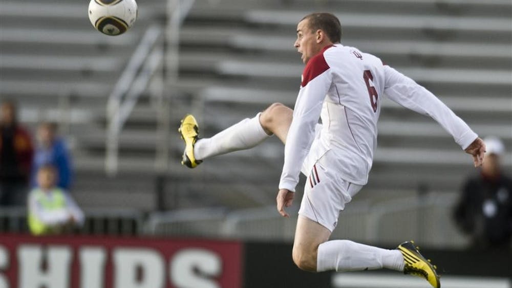 Junior midfielder Chris Estridge attempts to control the ball during IU's 1-1 draw against Wisconsin Sunday at Bill Armstrong Stadium.