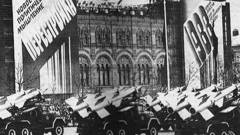 Archive:&nbsp;SA-3 surface-to-air missiles parading through Red Square during the annual celebration of the Bolshevik revolution. The signs in the rear proclaim support for Soviet President Mikhail S. Gorbachev's reforms.