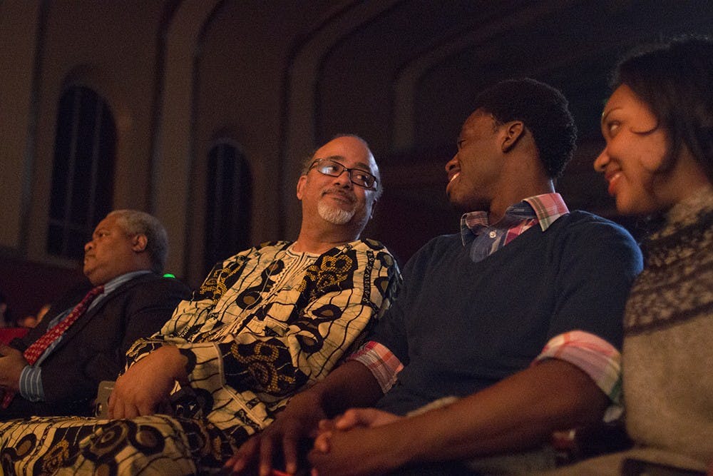 Eric Love; former director of diversity education under DEMA; speaks to former student worker Yusuf Agunbiade. Love returned to campus on Feb. 21 to watch the RAAS Royalty indian dance competition. Love was the faculty advisor before his departure.