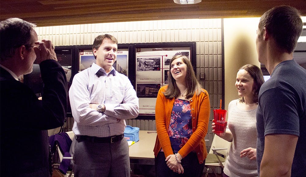 Michael McGuire, left, executive associate dean, RJ Woodridge, director of the Undergraduate Programs Office, Michele Sassano, assistant director of Admissions and Student Services, Megan Siehl, director of Graduate Student Services, and Dan Esposito , student and president of the Graduate Student Association talk Thursday at the SPEA Tavis Smiley Atrium. Administrators gathered in the atrium to celebrate SPEA being the number one ranking graduate program.