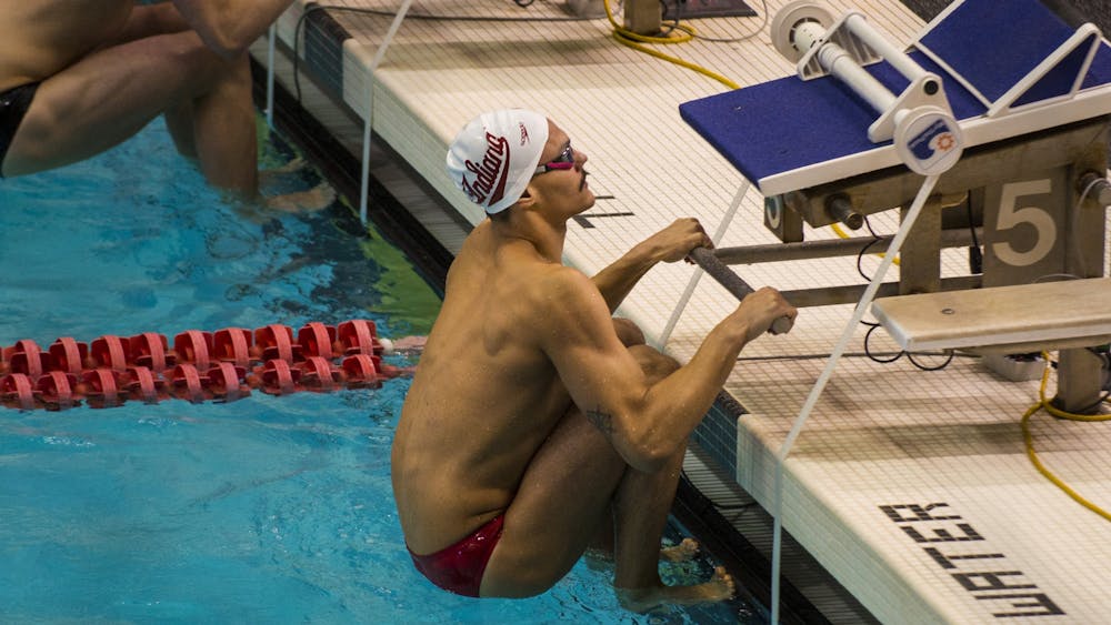 Junior Gabriel Fantoni gets ready to start the men’s 200 meter backstroke Jan. 25 at the Counsilman-Billingsley Aquatics Center. IU will compete on the road against the University of Louisville Saturday.