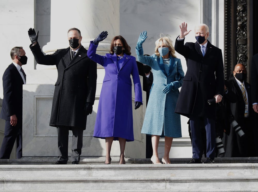 <p>U.S. President Joe Biden, right, with first lady Jill Biden, second from right, Vice President Kamala Harris, second from left, and her husband Douglas Emhoff, left, arrive on the East Front of the U.S. Capitol on Wednesday in Washington.</p>