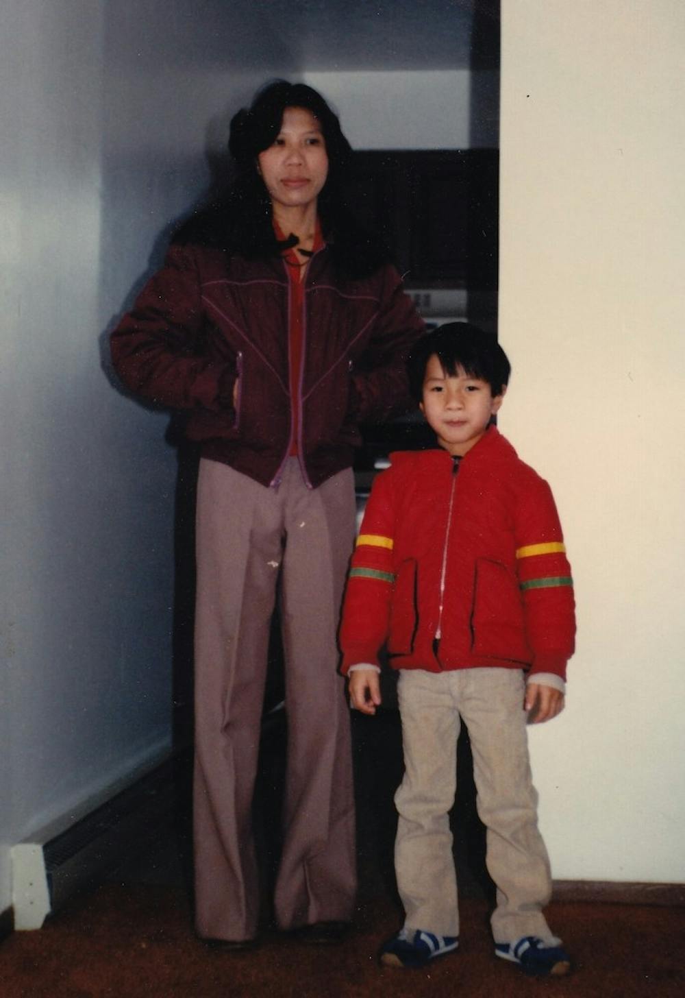 Giap, left, escaped to America when South Vietnam was collapsed in 1975. She raised Tony Nguyen in Seymour, Indiana. They were the first Asian family in Seymour, Ind. Nguyen recently documented his mother's final day of work at the ironing board factory, called "Giap's Last Day at the Ironing Board Factory."