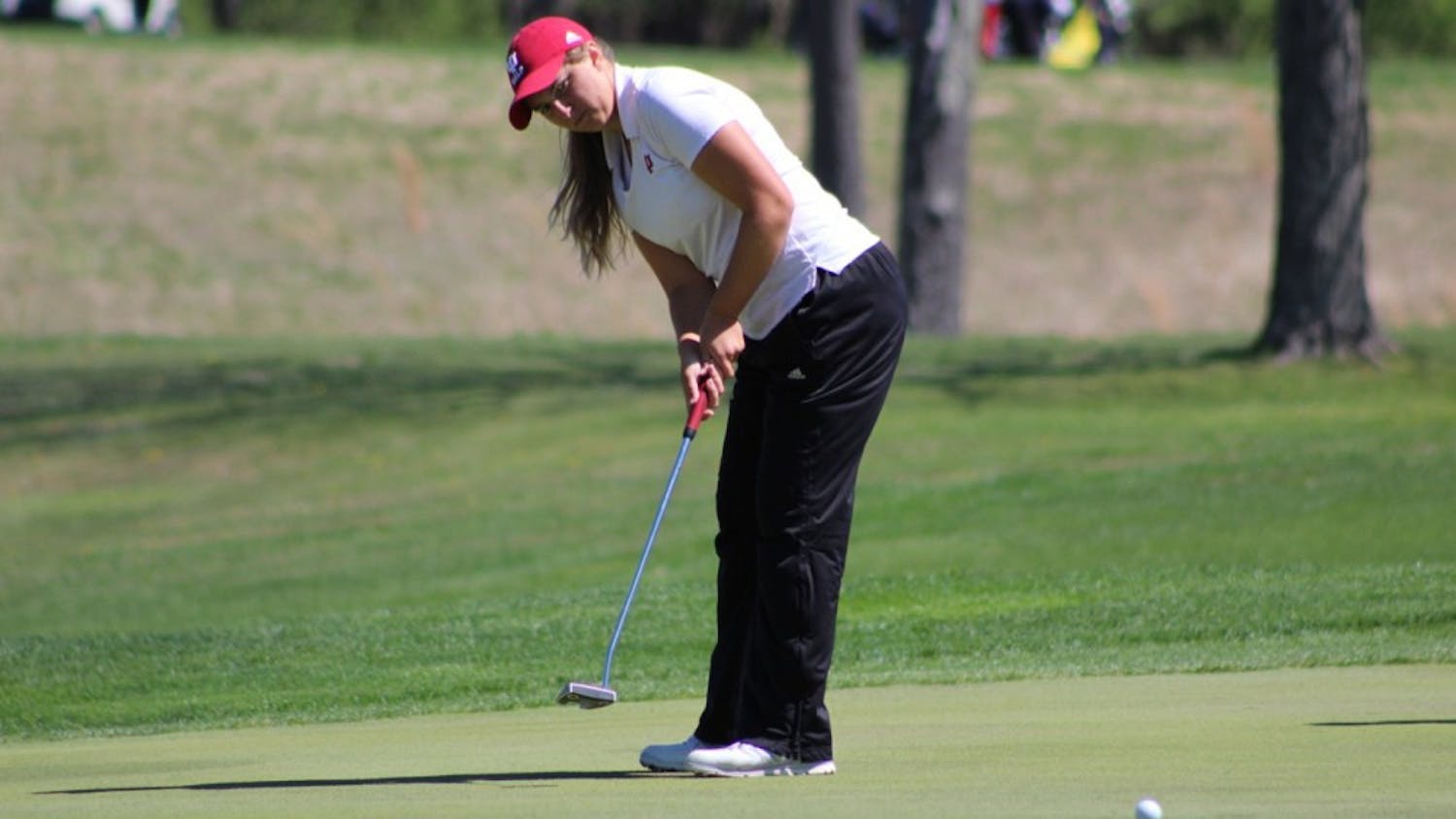 Sophomore Erin Harper putts during the first round of the IU Invitational at IU Golf Course. Harper finished tied for 25th at the Big Ten Championships in Cincinnati, Ohio.&nbsp;