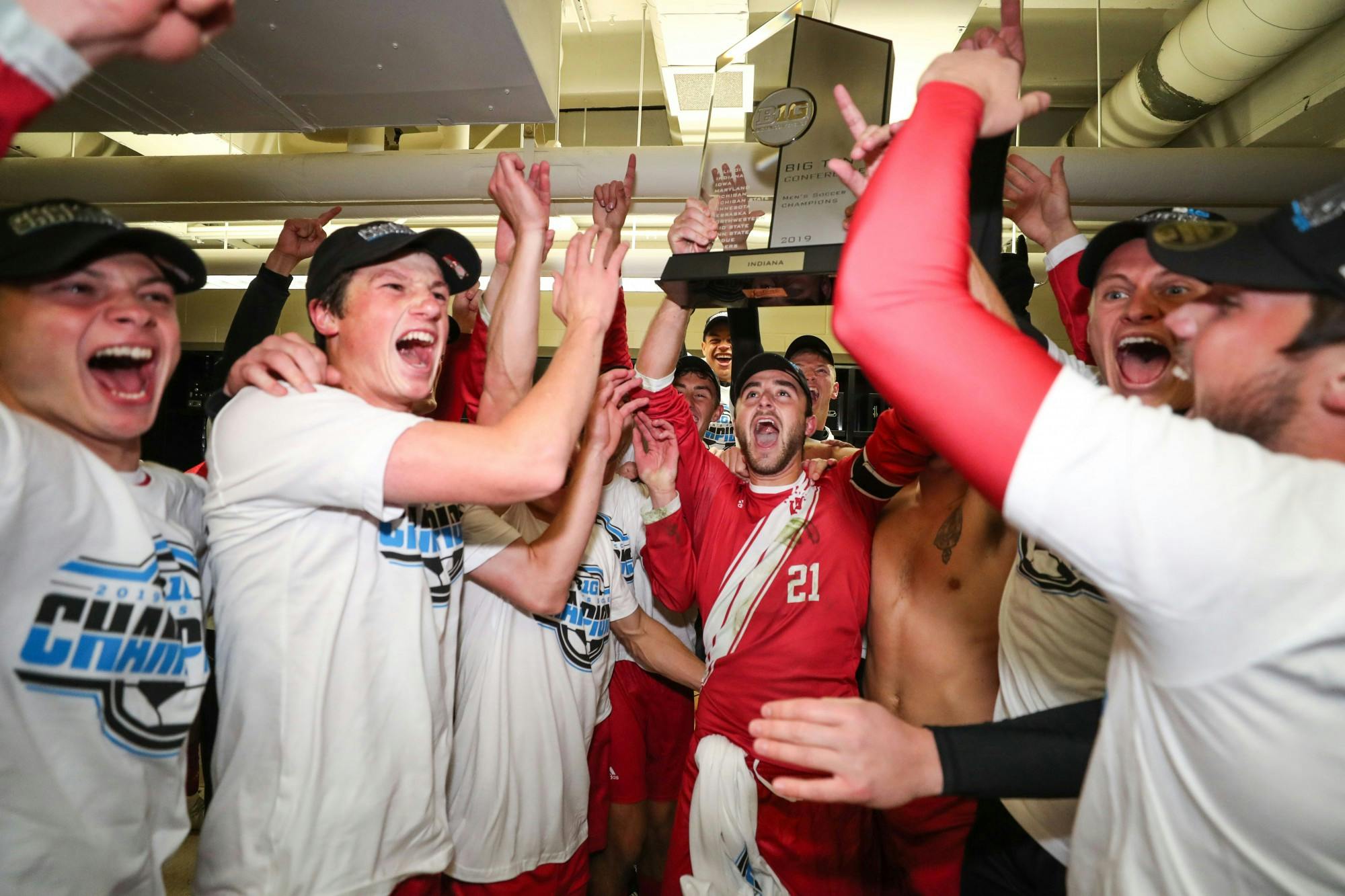 The IU men's soccer team celebrates in the locker room after clinching the Big Ten regular season championship Nov. 3 in East Lansing, Michigan. The Hoosiers received 12 Big Ten postseason awards.