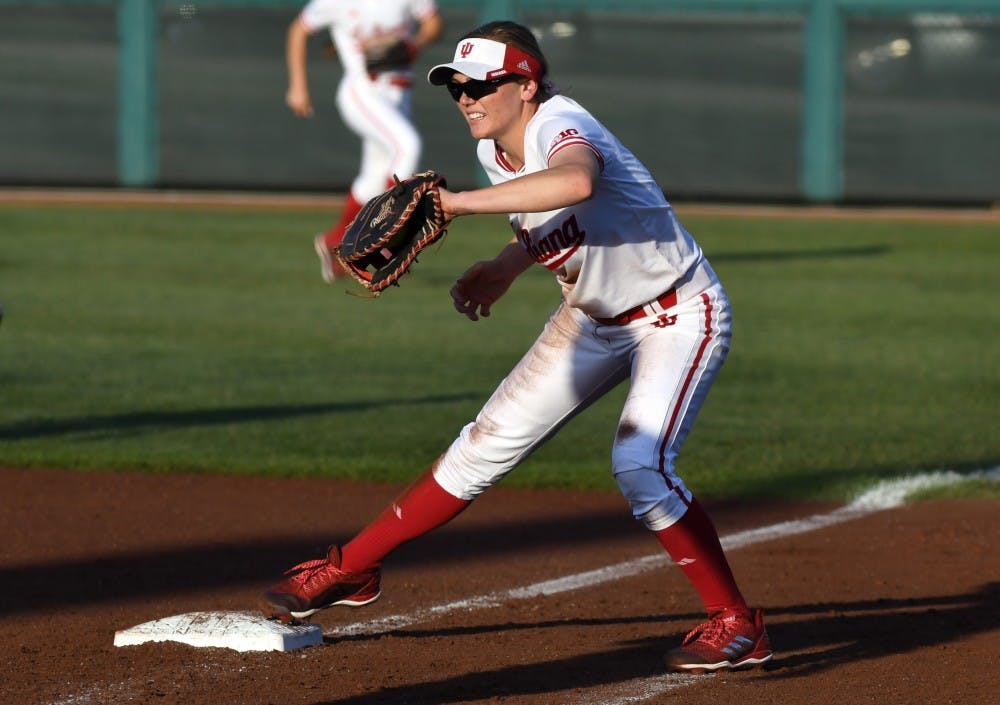 <p>Senior infielder Taylor Uden catches a ball to get a runner out at first base against Michigan on April 27 at Andy Mohr Field. Uden hit a solo walk-off home run to defeat Illinois 2-1.</p>
