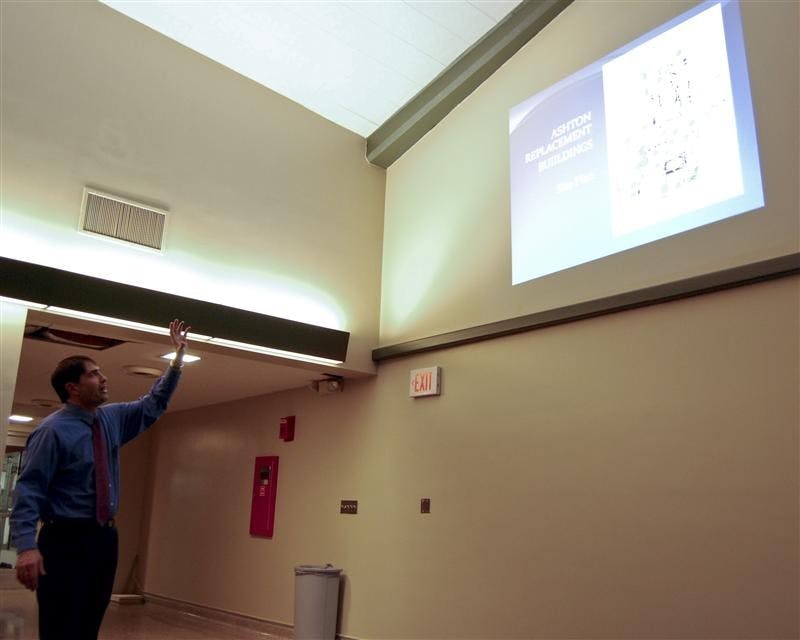 Pat Connor, executive director of residential programs and services, presents plans for New Ashton during an open meeting Wednesday evening at Barnes Lounge in the Ashton residence hall. Connor and Ashton residents discussed parking concerns and noise levels after the presentation.