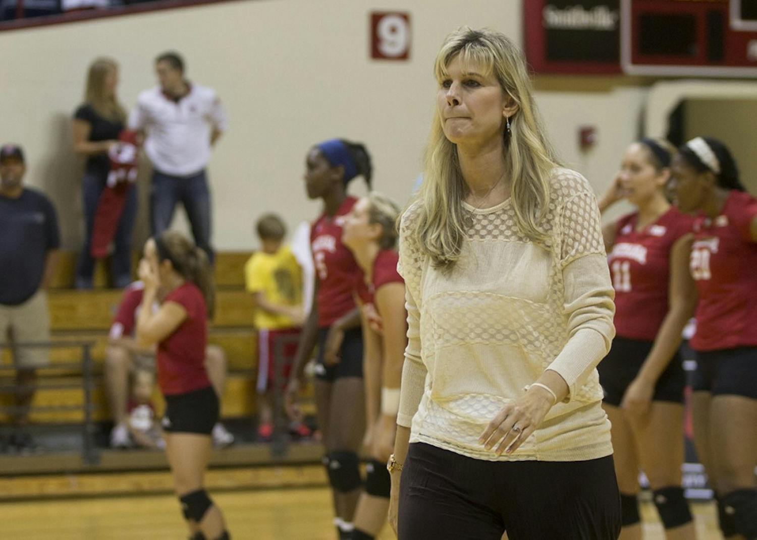 Former IU volleyball Coach Sherry Dunbar-Kruzan walks to greet the Southeast Missouri State University head coach before the Indiana Invitational in 2014 at Assembly Hall. Dunbar-Kruzan's contract will not be renewed after coaching 11 seasons at IU.