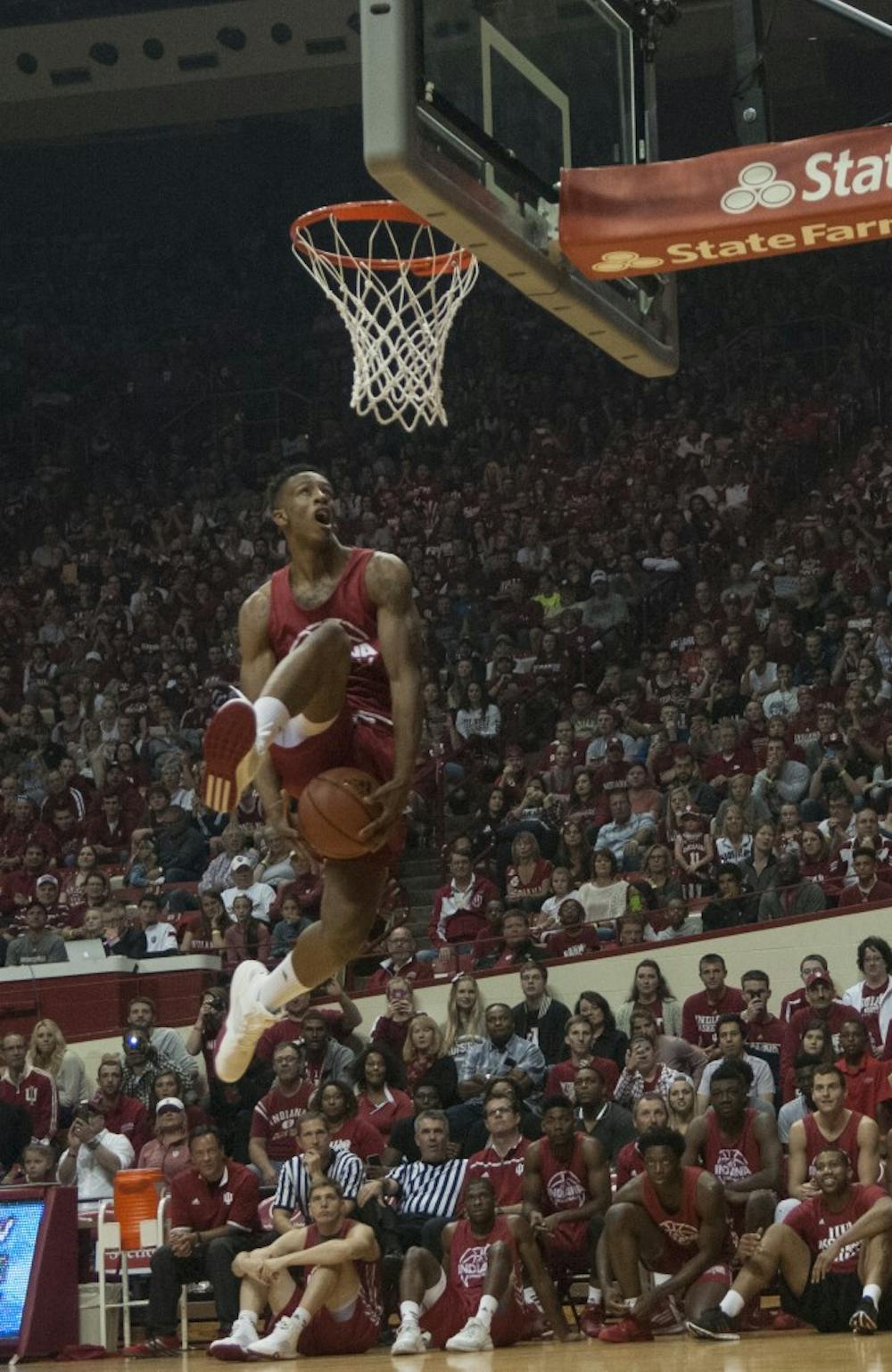 Junior Troy Williams dunks during Hoosier Hysteria on Saturday evening at Assembly Hall. Williams won both the 3-point and dunk contest.