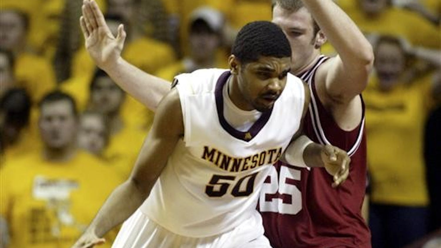 Minnesota forward Ralph Sampson, III (50) drives against Indiana forward Tom Pritchard (25) during the first half Tuesday in Minneapolis.