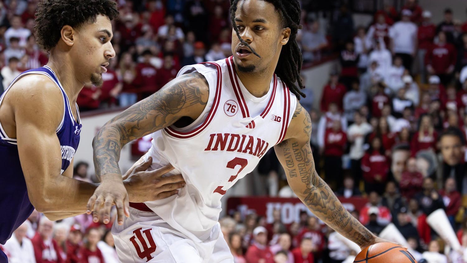 Senior Lamar Wilkerson dribbles and defends the ball against Northwestern on Feb. 24, 2026, at Simon Skjodt Assembly Hall in Bloomington. Wilkerson had five defensive rebounds during the game.