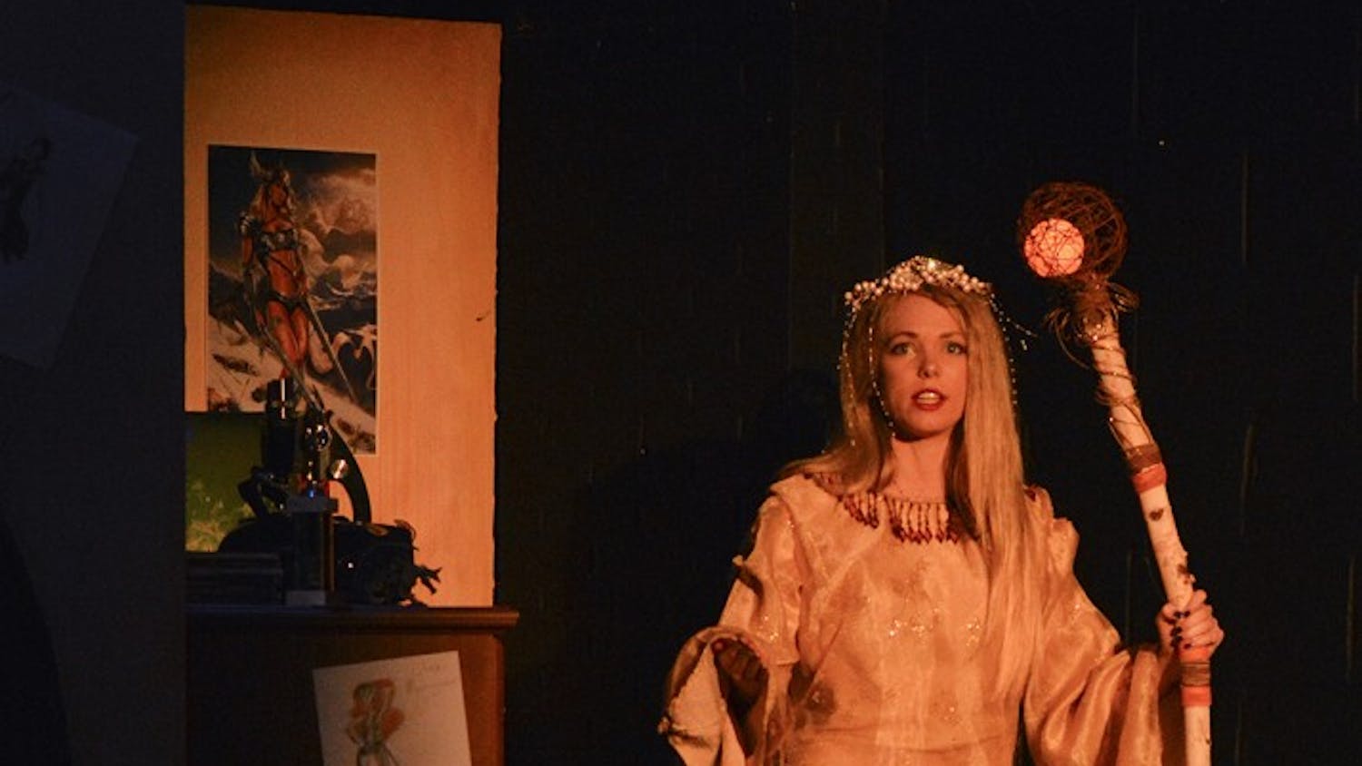 The Narrator of the play "She Kills Monsters", played by Kelsey Carlisle, tells the story of a teenager who seeks refuge from the loss of her family in her sister's beloved role-playing world at the Bloomington Playwrights Project on Wednesday.