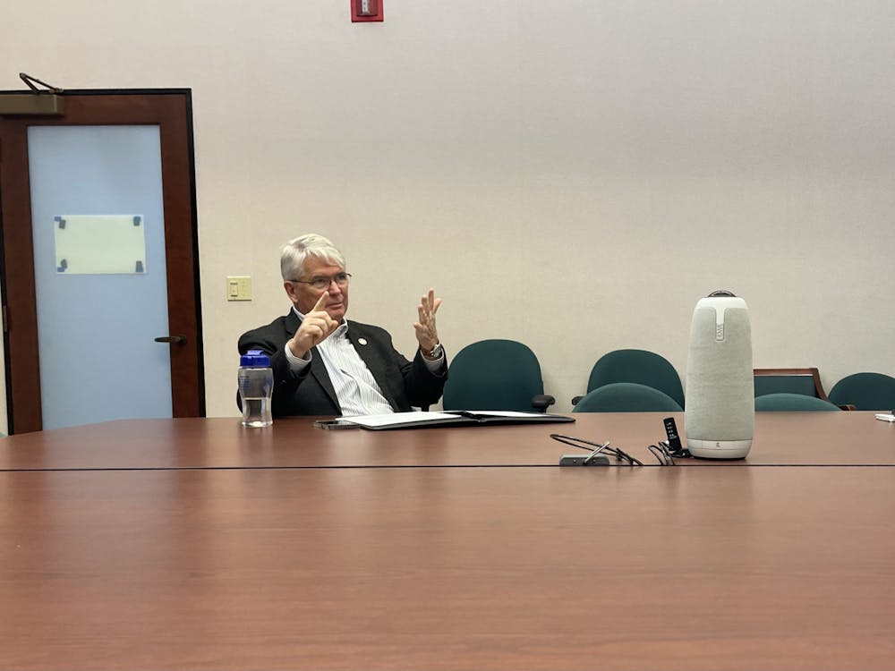 Mayor John Hamilton discusses his administration&#x27;s 2024 budget proposal with reporters in a conference room located in City Hall Monday. The budget increase reflects an increase in property and income tax revenue. 