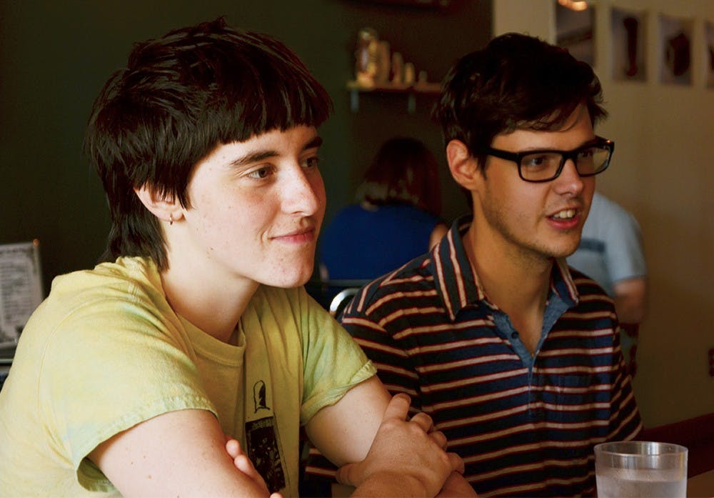 Duk Groves, left, and Stone Irr, two local song writers, talk about the inspirations of their music Monday at the Owlery restaurant, 