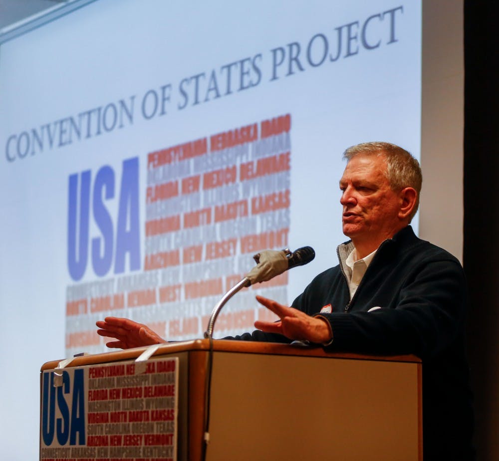 Indiana coalitions director of the Convention of States Marty Wood explains how the Article V and the convention can restrict the power of the federal government to stop the growth of the national debt Tuesday at Monroe Couty Public Library. 