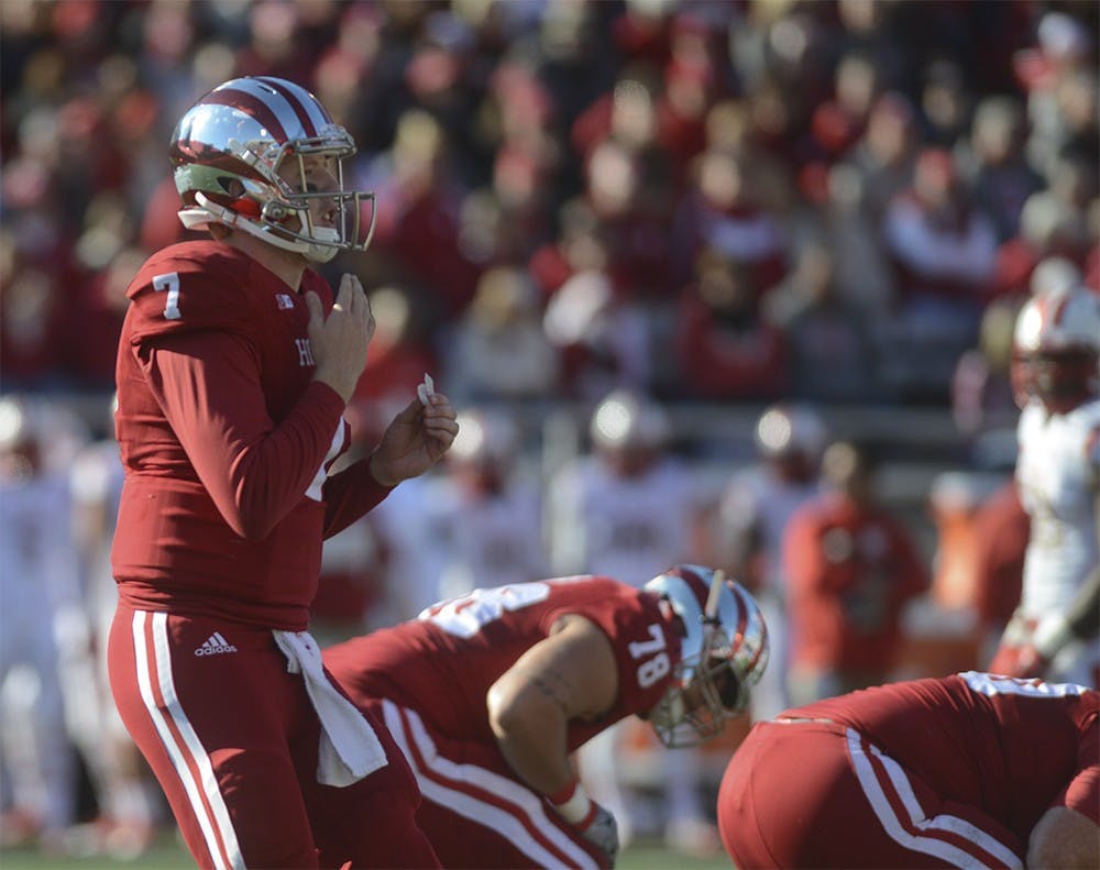 Quarterback Nate Sudfeld looks to the sideline for a play during the game against Rutgers on Saturday at Memorial Stadium. The Hoosiers lost, 52-55.