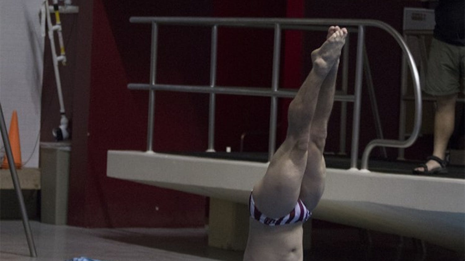 Diver Joshua Arndt goes into his fifth dive of the three-meter competition on Friday at Counsilman Billingsley Aquatic Center. Arndt competed with Cody Coldren and nine other divers in the quad meet.