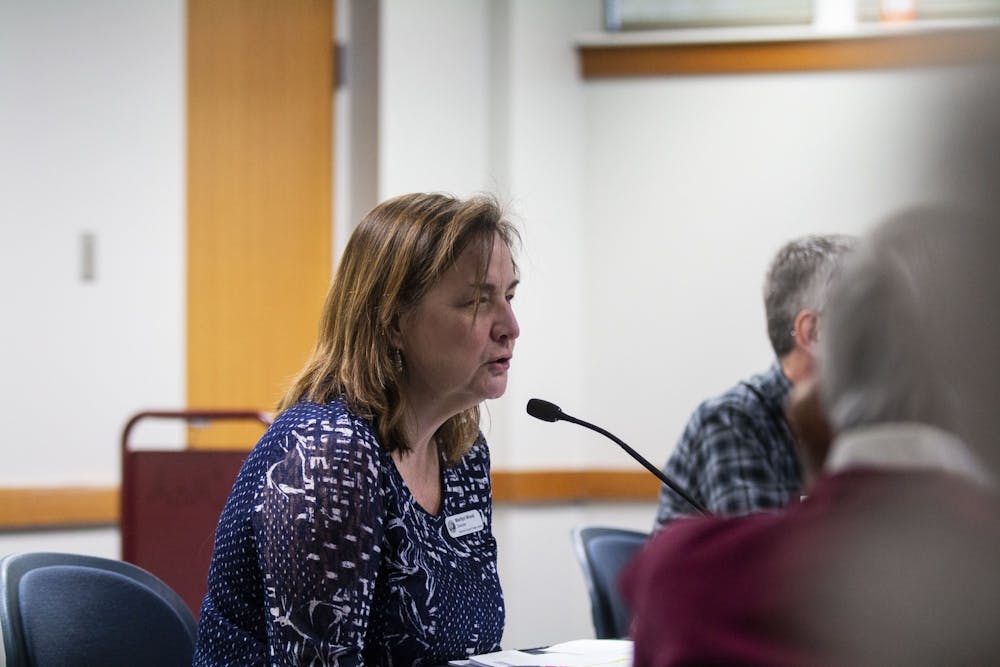 <p>Director of the Monroe County Public Library Marilyn Wood speaks during a special meeting March 4 at the Monroe County Public Library. The Board of Trustees approved a plan to construct a new library branch on the southwest side of Bloomington next to Batchelor Middle School. </p>