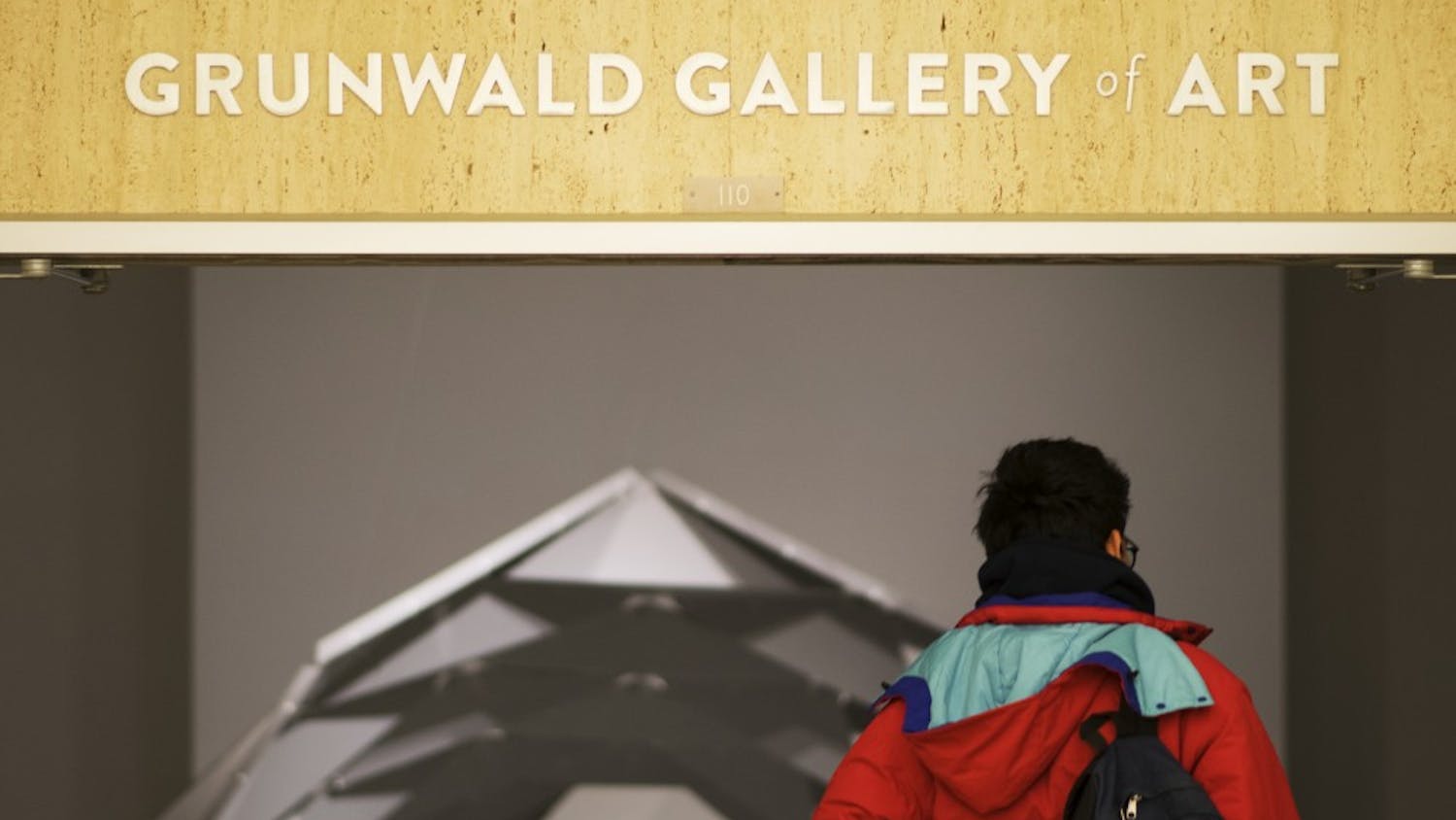 Then-junior Nicolas Martinez enters the Grunwald Gallery of Art, a gallery on the second floor of the Fine Arts Building that features art by professionals and students.&nbsp;