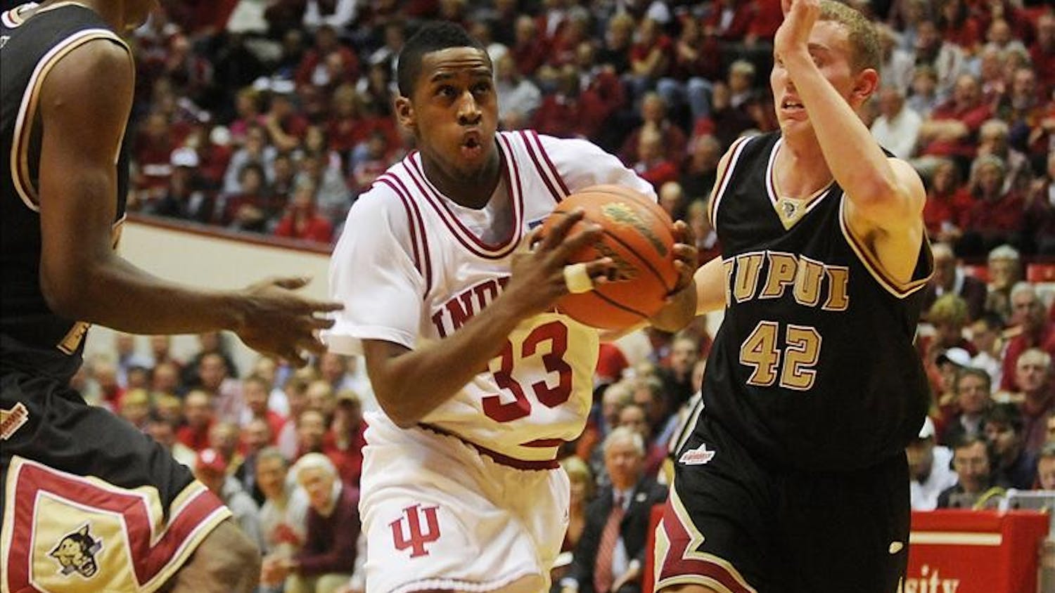 IU guard Devan Dumes navigates the lane during IU's 60-57 win over IU-Purdue University Indianapolis Nov.19, 2008 at Assembly Hall. Dumes had 10 points.