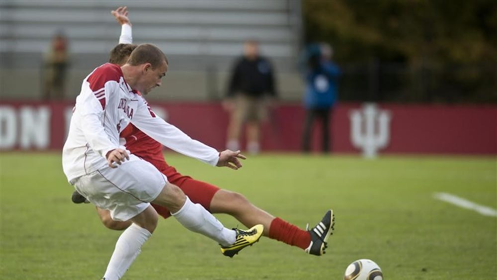 Junior midfielder Chris Estridge shoots during IU's 1-1 draw against Wisconsin on Oct. 3 at Bill Armstrong Stadium. Estridge, from Indianapolis, played at Wake Forest before returning to IU this year.