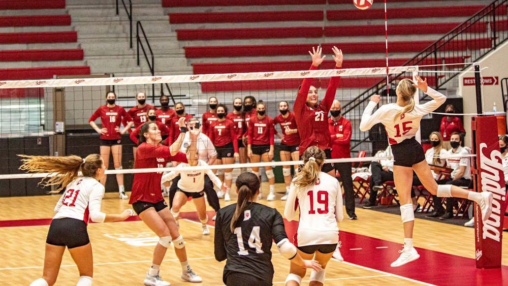 Then-freshman middle blocker Savannah Kjolhede spikes the ball Feb. 12, 2021, in Wilkinson Hall. Indiana volleyball will play  No. 25 Michigan at 7 p.m. Oct. 21 in Ann Arbor, Michigan.