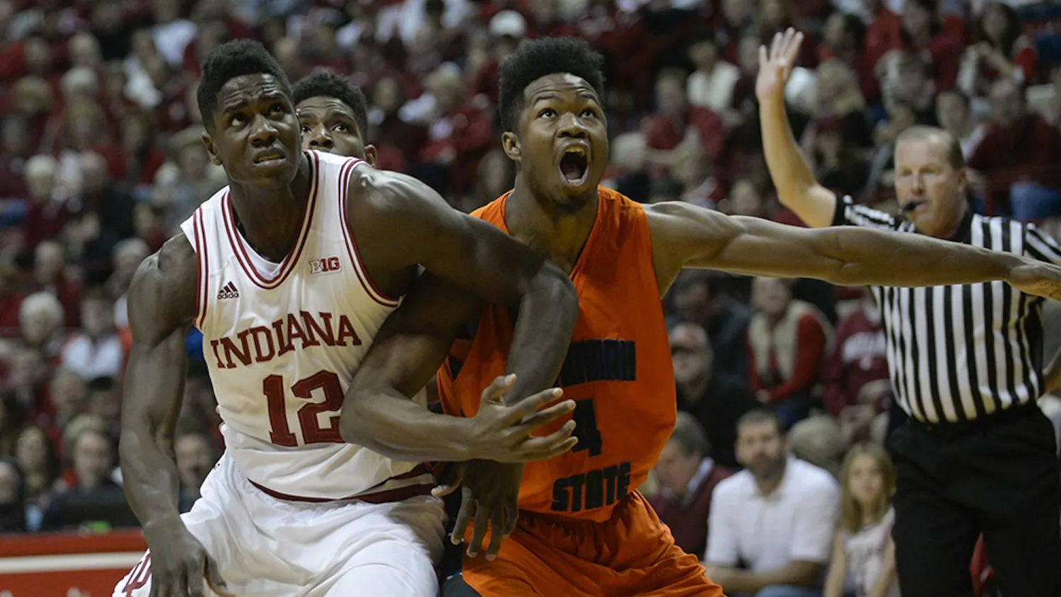 Junior Hanner Mosquera-Perea fights for position to rebound a free throw during IU's game against Savannah State on Saturday at Assembly Hall.