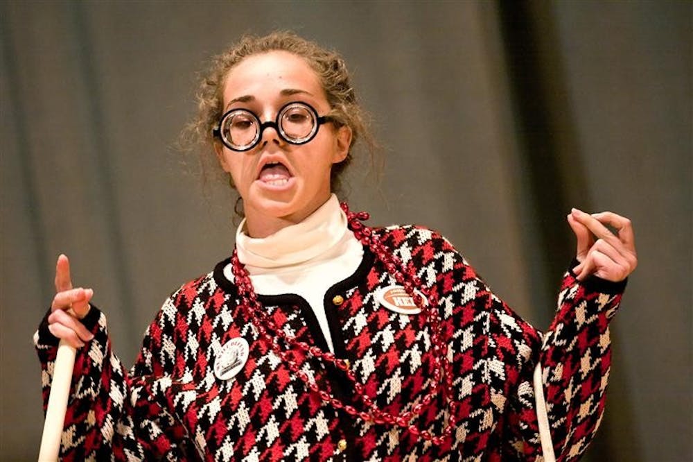 A member of the Student Athletic Board performs during Yell Like Hell Thursday evening in the Indiana Memorial Union. The skit pitted 'old people' against 'students' with the chant 'stand up old people.'