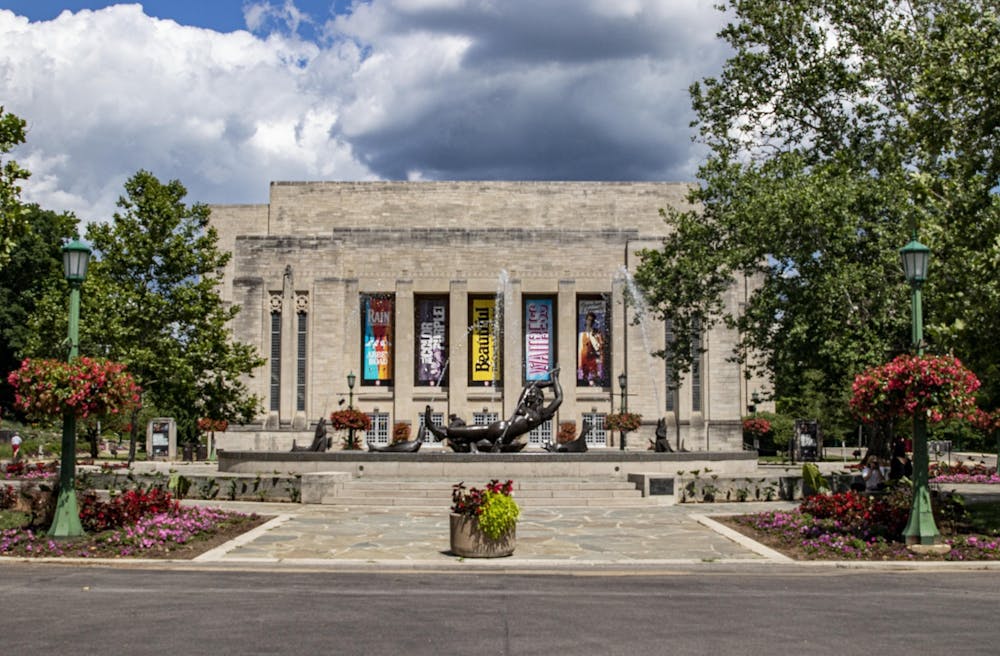 <p>The IU Auditorium is seen July 10, 2022, behind Showalter Fountain. The auditorium will feature a variety of performances during the spring semester of 2023.</p>
