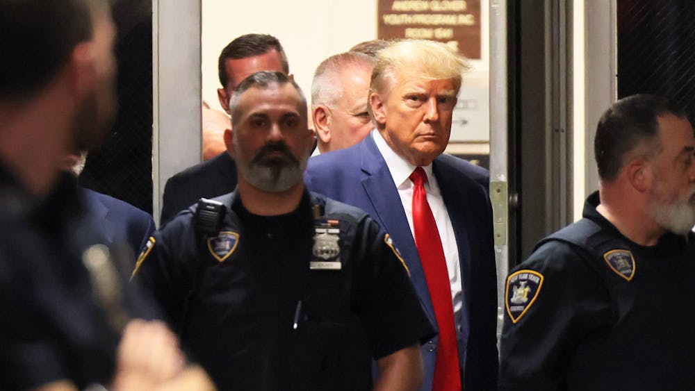 Former President Donald Trump arrives for an arraignment hearing at the New York Supreme Court on April 4, 2023, in New York. Trump has been indicted on 34 counts of fraud.  