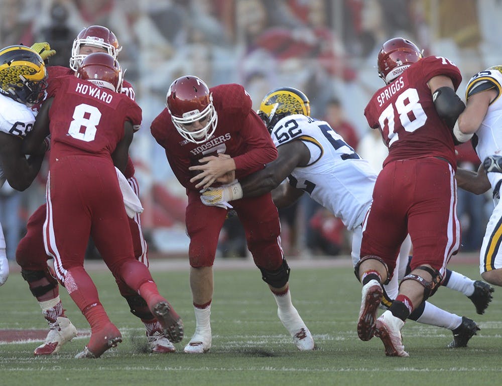 Quarterback Nate Sudfeld runs during the against Michigan on Nov. 14 at Memorial Stadium. The Hoosiers lost in double overtime, 41-48.