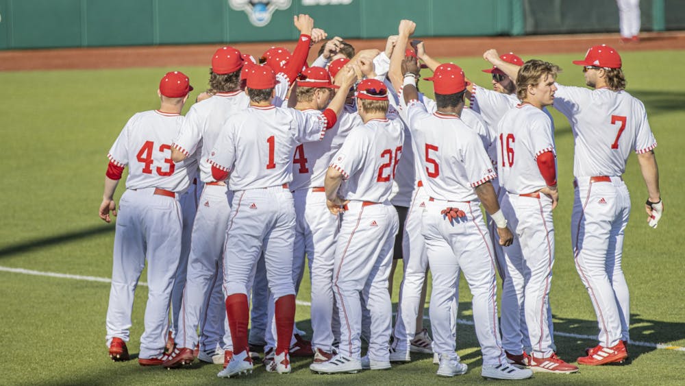 IU baseball huddles up prior to its home opener against Miami University on March 1, 2022, at Bart Kaufman Field. Indiana will play Cincinnati on March 8 in Bloomington, Indiana. 