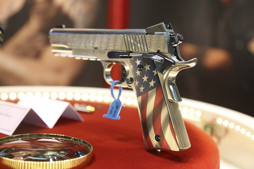 Firearms and related products were displayed and speakers discussed gun-related issues at the 143rd NRA Annual Meeting & Exhibits at the Indiana Convention Center on April 26, 2014. 