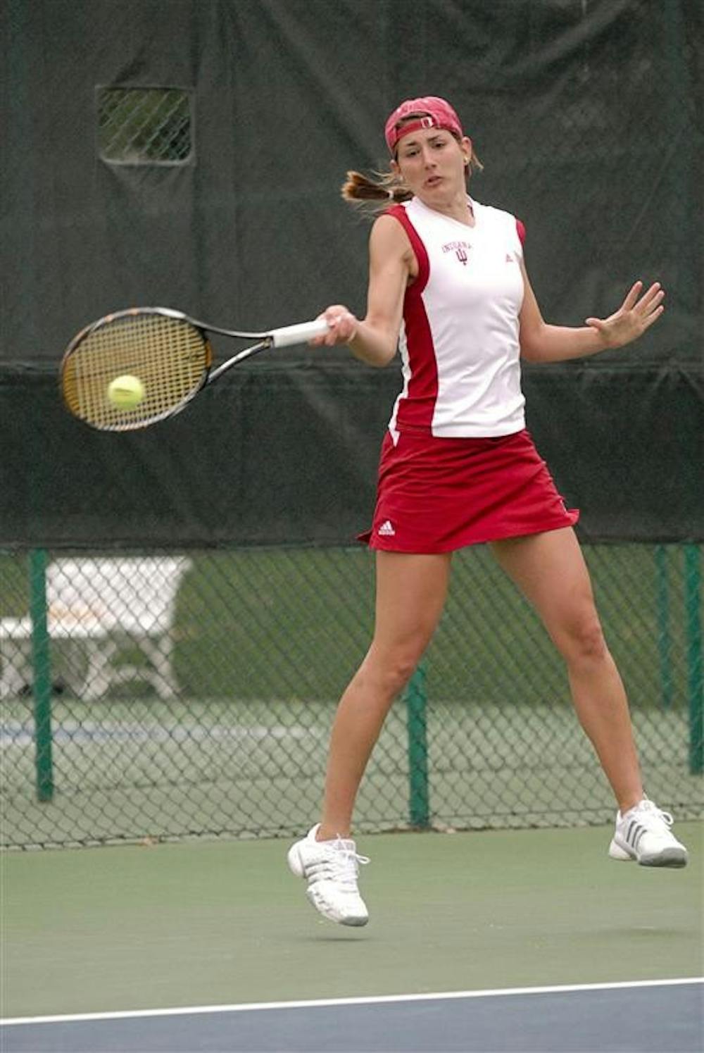 Sophomore Myriam Sopel swings through a forehand. Sopel won both her matches in straight sets and her win over Minnesota helped clinch the win for IU.