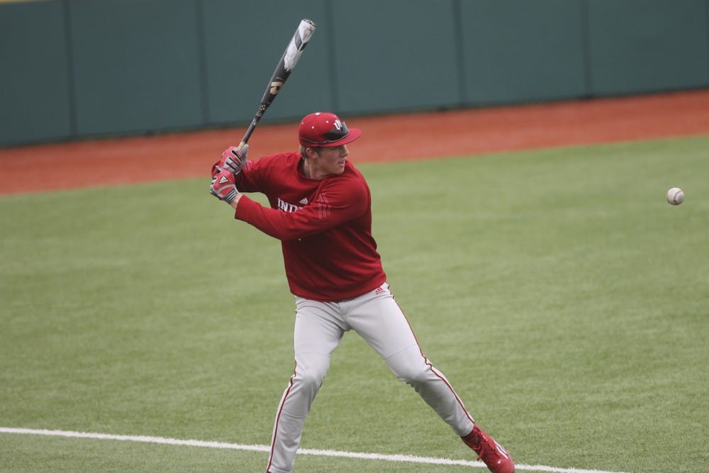 Freshman outfielder Logan Sowers practices his swing on Feb. 11, 2015, at Bart Kaufman Field.