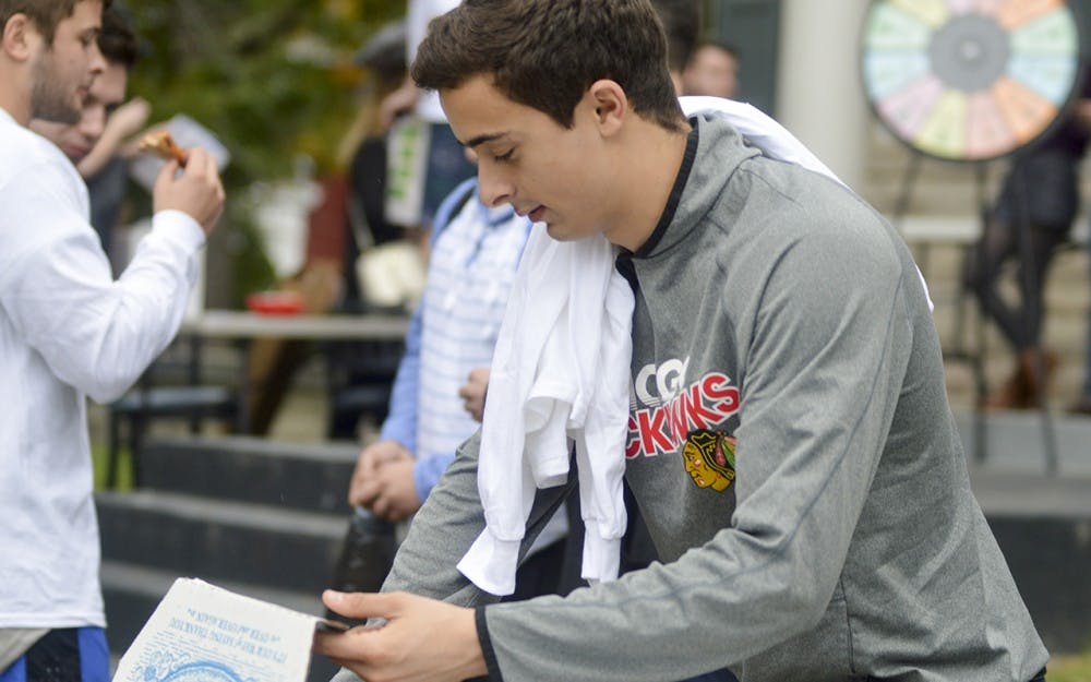 Sigma Chi fraternity brothers invite IU students to enjoy pizza, live music, and guest speakers during their second annual Sexual Assault Awareness event held in the Sigma Chi front yard Wednesday evening. The brothers aim to increase awareness of sexual assault on campus with important guest speakers such as Attorney General Greg Zoeller and Men Against Rape and Sexual Assault (MARS).