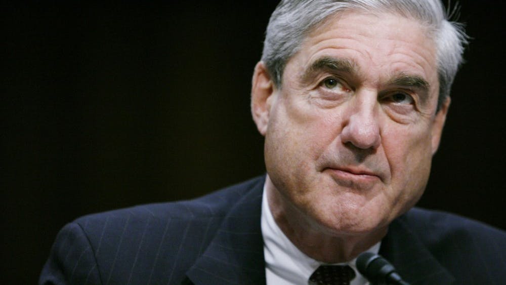 Robert Mueller testifies before a Senate Intelligence Committee hearing in February 2011 in Washington, D.C. The investigation led by Mueller into Russian meddling in the 2016 presidential election delivered its first charges in relation to actual election meddling Friday.