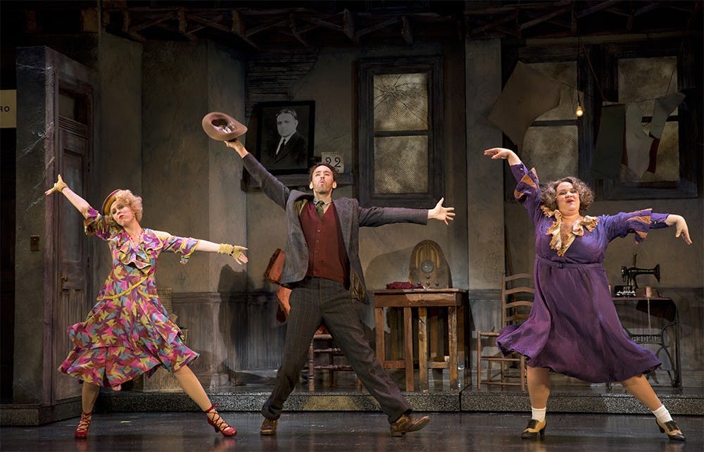 Lucy Werner as LILY, Garrett Deagon as Rooster Hannigan and Lynn Andrews as Miss Hannigan in the number "Easy Street" from the musical "Annie".