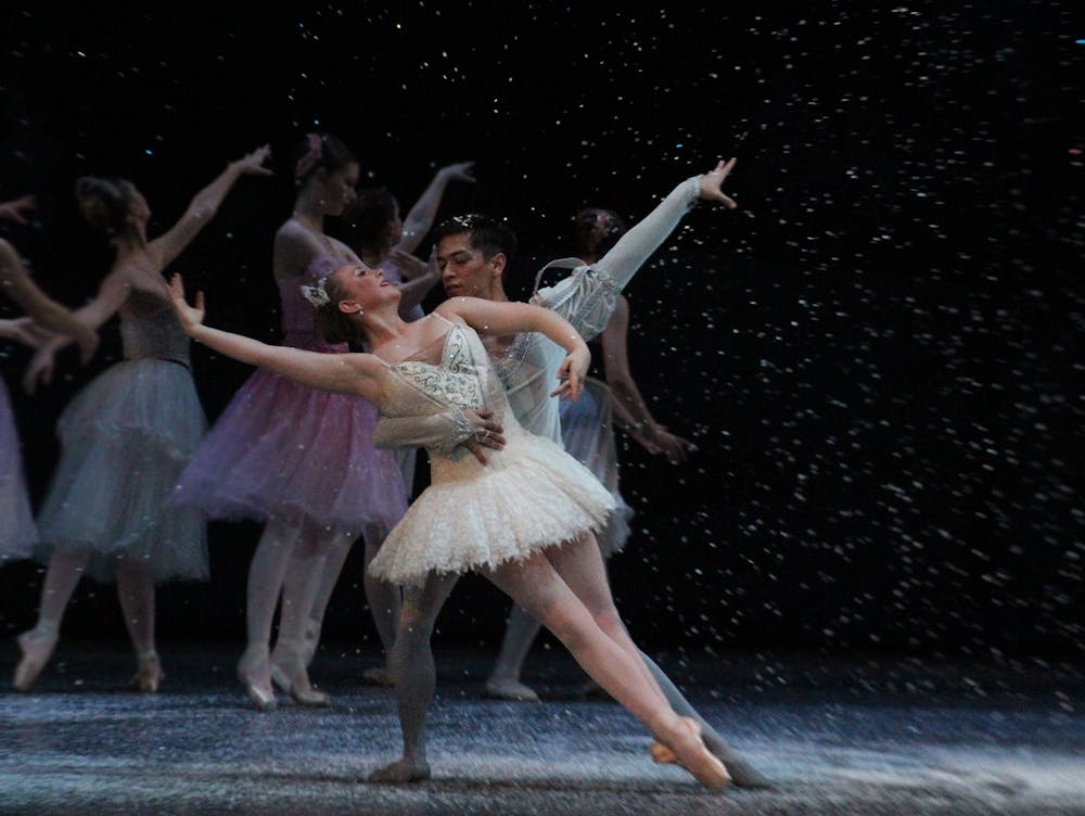 <p>Jacobs School of Music Ballet Theater senior Joaquin Ruiz and junior Maddie Tyler dance as the Snow King and Queen in a dress rehearsal for &quot;The Nutcracker&quot; on Nov. 29, 2022, at the Musical Arts Center. &quot;The Nutcracker&quot; will run from Dec. 2-4 at the Musical Arts Center with different casts.</p>