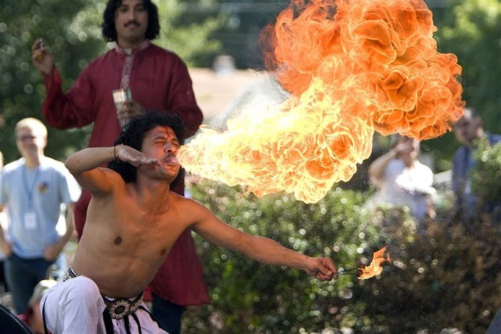 Fire breather with Dhoad Gypsies during a performance at the 2007 Lotus in the Park.