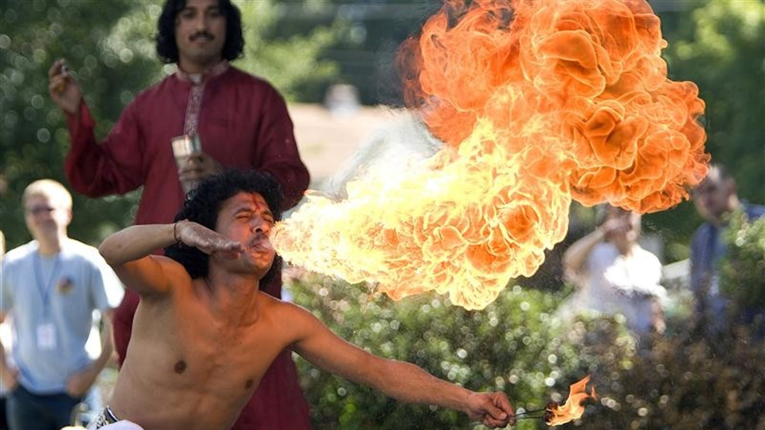 Fire breather with Dhoad Gypsies during a performance at the 2007 Lotus in the Park.