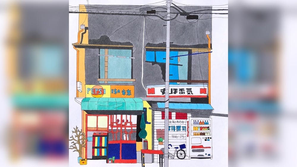日本东京，新生Vika Terrill创作了一幅描绘商店门面的艺术品。