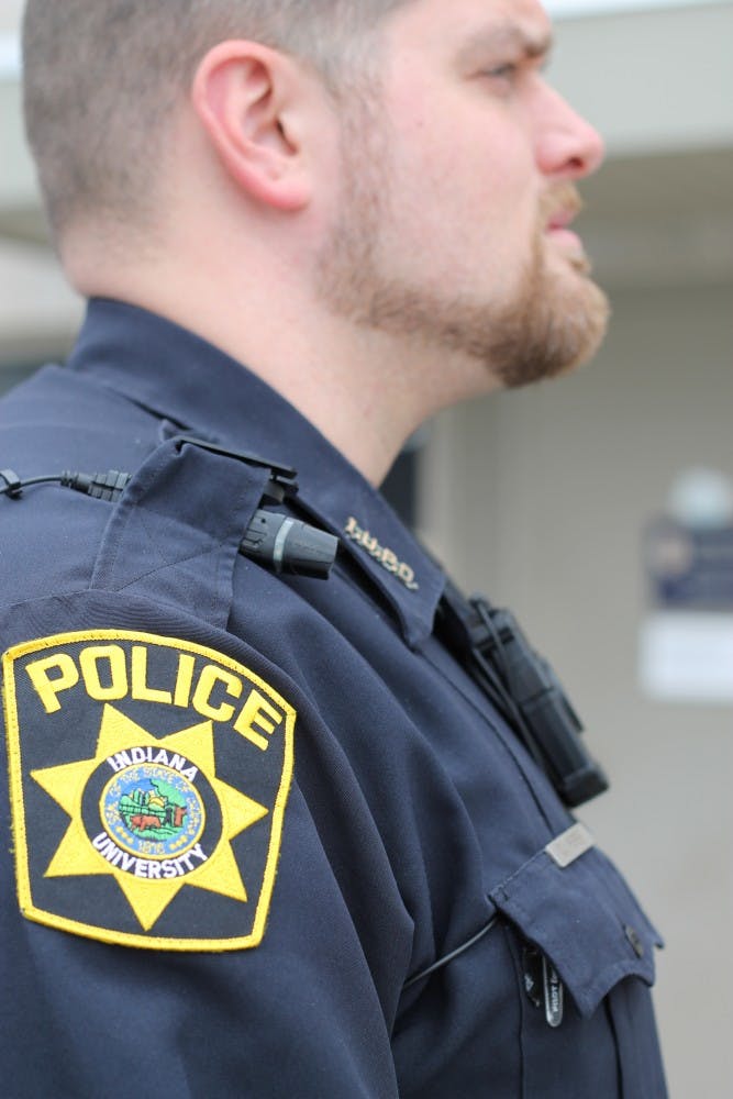 IUPD Officer Chad Warner wears a shoulder mounted camera in a field test.